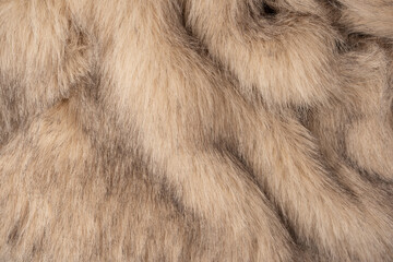 Texture of faux fur as a background, top view.