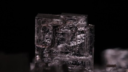 White crystal on black background, minimalistic photo, salt crystal growth, science experiment, school experiment	 - Powered by Adobe