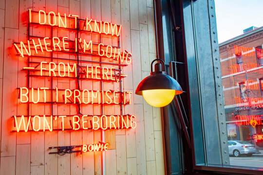Red David Bowie quote neon sign located in Denver Colorado