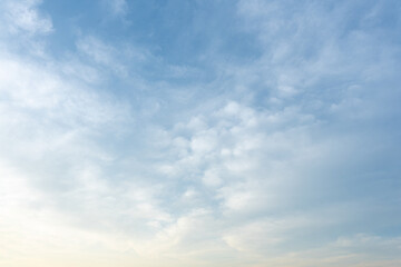 Serene Sky Soft White Cumulus Clouds Drifting Across a Pale Blue Heaven