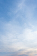 Serene Light Blue Sky with Wispy Clouds Peaceful Nature Background Calm Atmosphere