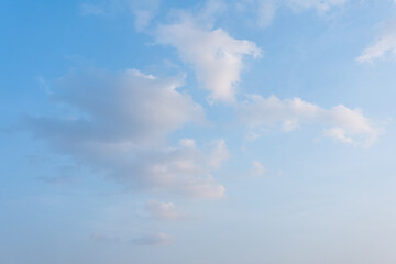 Serene Blue Sky with Scattered Cumulus Clouds Peaceful Nature Background