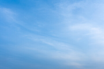 Serene Blue Sky with Wispy Cirrus Clouds Peaceful Nature Background