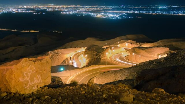 Time Lapse of car trial at night Hafeet mountain, Al Ain, Abu Dhabi, UAE