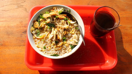 Traditional Indonesian Soto Soup Served in a Bowl