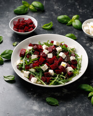 Fresh Beetroot feta salad with wild rocket and lemon dressing. Healthy food.