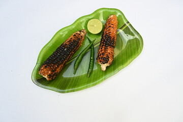 Grilled Sweet corn cob on whitebackground. This is a complete food for humans. It contains many vitamins. It's like all over world. Heathy eating. 