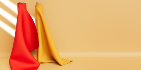 yellow and red Fabric Rolls in front of empty background with copy space