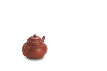Old clay chinese teapot with copy space isolated on white background with clipping path.