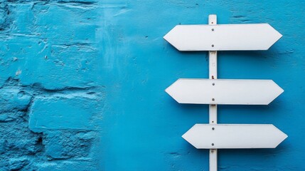 This close-up comparison background has two blank signs on a blue background that serve as direction signs and copy space for your text.