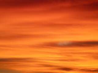 Dusk, Sunset Sky Clouds in the Evening with colorful Orange, Yellow, Pink and red sunlight and Dramatic storm clouds on Twilight sky, Landscape horizon