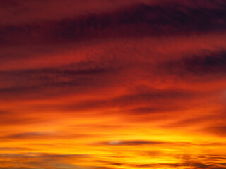 Dusk, Sunset Sky Clouds in the Evening with colorful Orange, Yellow, Pink and red sunlight and Dramatic storm clouds on Twilight sky, Landscape horizon