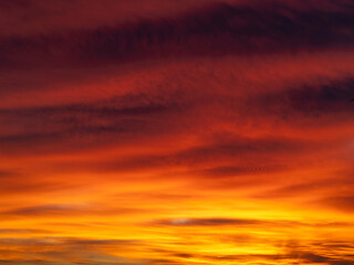 Dusk, Sunset Sky Clouds in the Evening with colorful Orange, Yellow, Pink and red sunlight and Dramatic storm clouds on Twilight sky, Landscape horizon