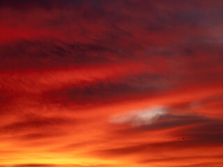 Dusk, Sunset Sky Clouds in the Evening with colorful Orange, Yellow, Pink and red sunlight and Dramatic storm clouds on Twilight sky, Landscape horizon