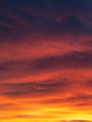Dusk, Sunset Sky Clouds in the Evening with colorful Orange, Yellow, Pink and red sunlight and Dramatic storm clouds on Twilight sky, Landscape horizon