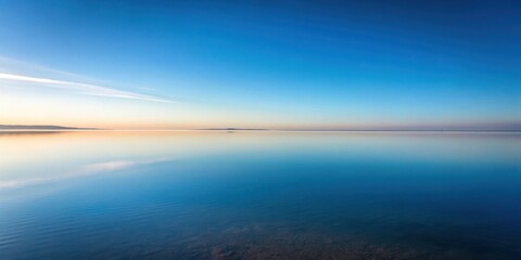 Fototapeta premium Serene Sunset Reflection on a Calm Body of Water, Presenting a Tranquil and Peaceful Atmosphere