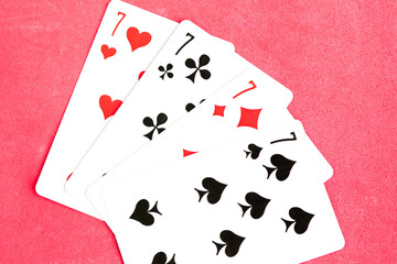 Poker quads playing card, green background