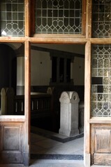 View of the internal space. Close-up of the column of the stairs.