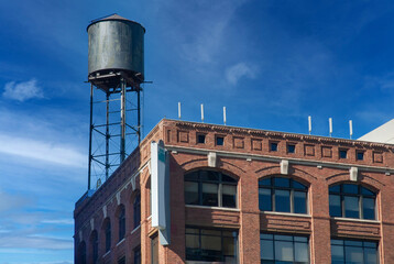 Historic building with water tower in downtown Detroit showcasing urban architecture and skyline