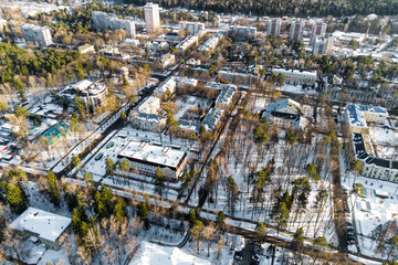Mid-rise urban development on a winter day, view of a small provincial town from the air