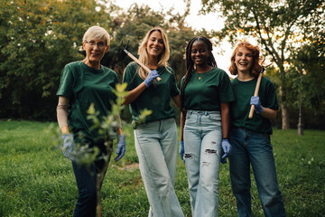 Volunteers planting trees in the forest