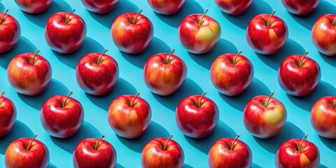 A vibrant pattern of red apples arranged in staggered rows against a bright blue background, creating a playful and symmetrical composition.