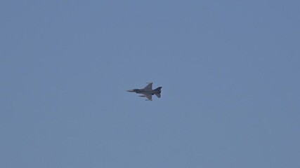 fighter jet banking turning heavily to avoid enemy contact during combat operation agility tactical maneuvers required high stakes military missions maneuvering war action air base flypast 