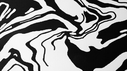 A black and white painting of a swirl with a white background. The painting has a sense of movement and energy, as if it is in motion. The black and white colors create a sense of depth and contrast