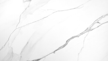 A white marble wall with cracks and holes. The wall is smooth and shiny, but the cracks and holes give it a rough and aged appearance. The contrast between the smooth surface