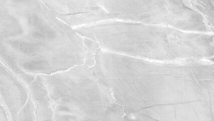 A grey stone wall with a few cracks and a few lines.  white gray rough texture background as banner template