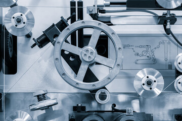 Complex Industrial Machine with wheels rollers with metal wire. The machine is made of metal and...
