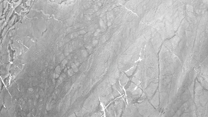 background of a stone wall with a gray and white pattern. The wall looks like it is made of marble and has a rough texture. The photo creates a sense of depth and volume