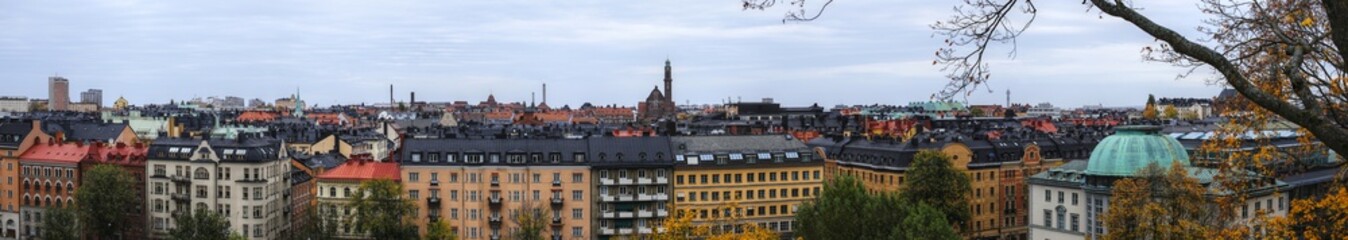 Stockholm cityscape view from observatorielunden, showcasing rooftops and skyline in autumn colors