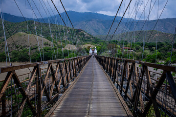 Obraz premium wooden bridge over the river