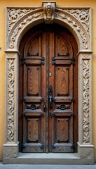 Obraz premium Rustic wooden door with intricate carvings, wood grain, texture, carvings
