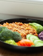 Healthy buckwheat meal with roasted vegetables.  A nutritious and delicious vegetarian dish.
