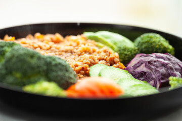 Healthy and delicious buckwheat bowl with assorted vegetables. A nutritious and flavorful meal, perfect for a light lunch or dinner.