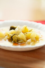 Hearty vegetable soup with potatoes and broccoli, perfect for a comforting meal.