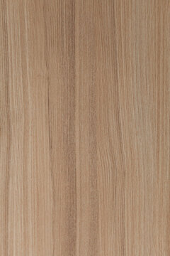 Light brown wood grain texture. Perfect for backgrounds, design projects, or any project needing a natural wood aesthetic.