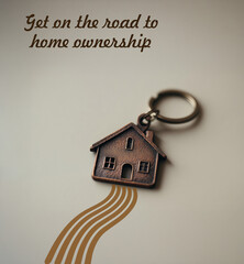 A keyring in the shape of a house for persons purchasing or renting a new home.