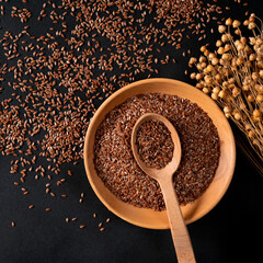 Healthy food. Healthy grains. Flax seeds in a wooden plate