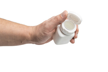 Male hand holding a blank white plastic bottle for medicine, pills, and vitamins, isolated on a transparent background