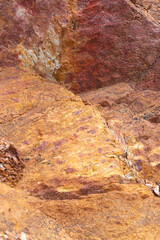 Detail of a colorful natural rock 
