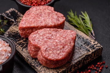 Raw beef or pork burger patty in the shape of a heart
