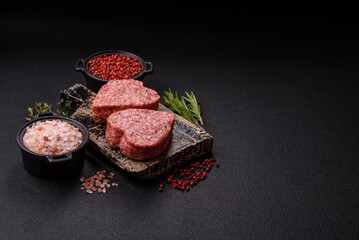 Raw beef or pork burger patty in the shape of a heart