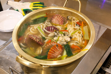 Korean traditional food. Seafood Kalguksu