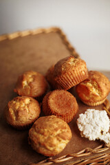 Muffin as small cake home made on wooden table
