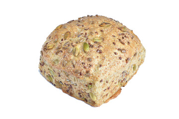 Wheat bread with sesame seeds lies on a white background.