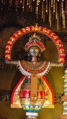 An idol of goddess durga at a pandal during durga puja in kolkata