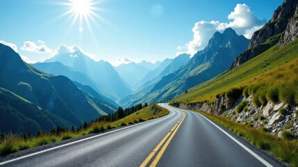 Naklejka premium A scenic highway curves through a majestic mountain range under a brilliant sun, offering a breathtaking view of verdant slopes and a valley below.